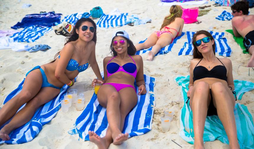Girls on the beach enjoying spring break, in the Bahamas