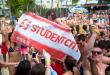 group holding up a StudentCity banner